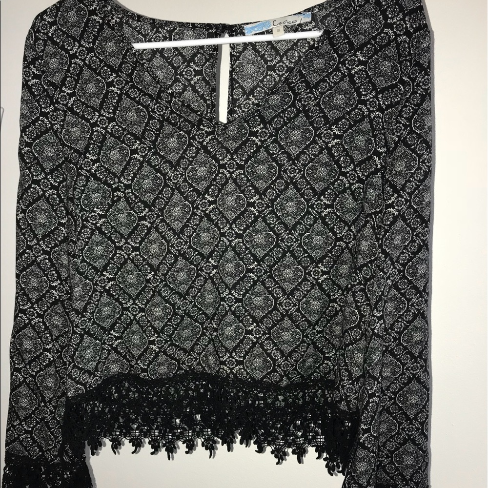 white with black pattern blouse
